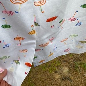 ☂ TALBOT - Rainbow embellished on white lined, above knee skirt. ☂